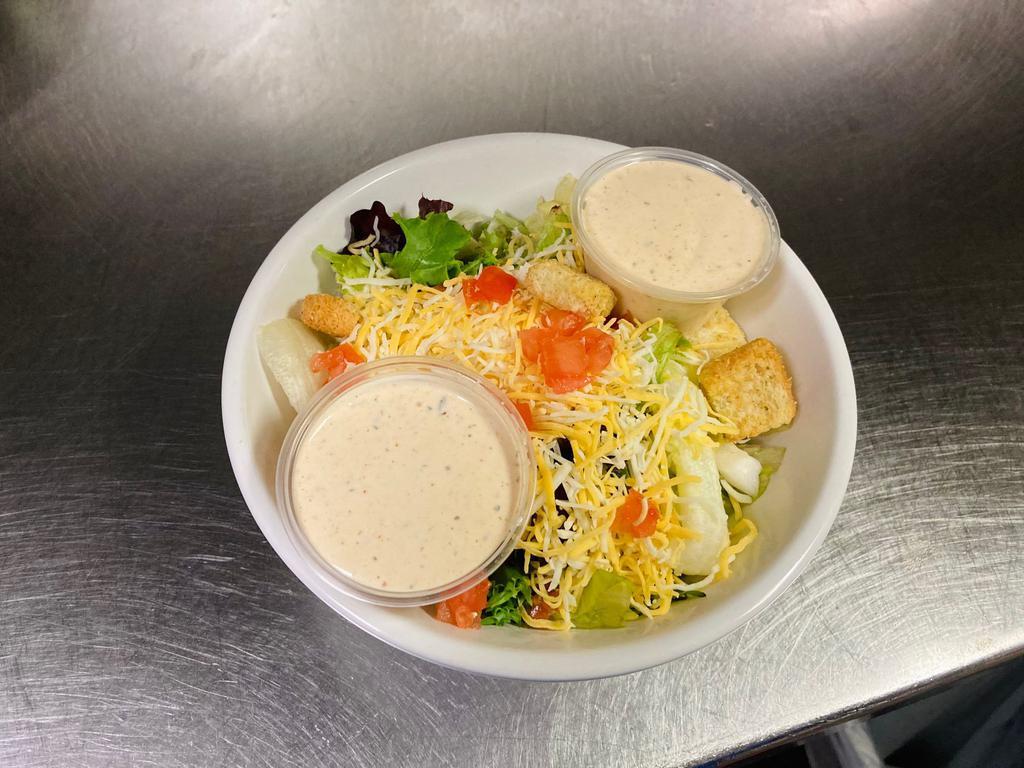 Little House Salad · Our side salad with mixed greens, shredded cheese, tomatoes and croutons. Choice of dressing