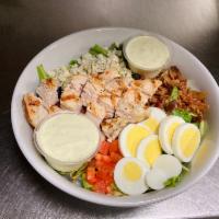 Chicken Cobb Salad · Mixed greens, bacon, tomatoes, boiled egg, and bleu cheese crumbles. We recommend Avocado Ra...