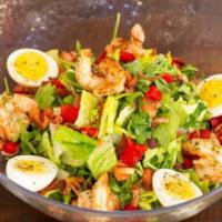 Mojitobar Milan Chopped Salad · Arugula, romaine, shrimp, bacon, roasted peppers, house dressing, tomatoes, and hard boiled ...