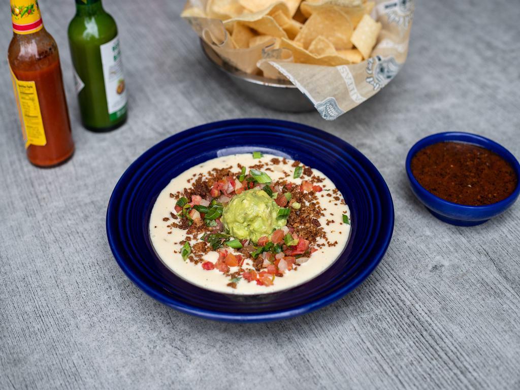 Get Your Freak on Queso · Our awesome queso with pico de gallo, guacamole, and molida ground beef.