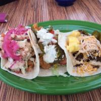 Taco Plate with 2 Sides · 2 tacos served on soft flour tortillas with choice of 2 sides.