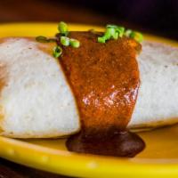El Big Burrito · Mexican yellow rice, Monterey Jack and cheddar cheese, black beans and topped with choice of...
