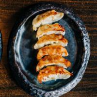 Pork Gyoza · Pan-fried Japanese dumpling with pork and vegetable. Comes with 6 pieces.