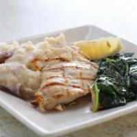 Mediterranean Chicken · Petite marinated chicken breast served over garlic mashed potatoes with sauteed spinach