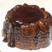 Chocolate Lava Cake · Our gift to chocolate lovers. A warm dark chocolate bundt cake filled with melted dark choco...