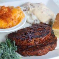 Cajun Meatloaf · Sliced homemade meatloaf with Cajun spices grilled over an open flame and brushed with our f...