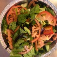 Fattoush Salad · Chopped lettuce, tomato, cucumber, pita chips, green and red pepper, sumac, mixed with olive...