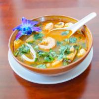Tom Yum Clay Pot Seafood Soup · Made with basil.