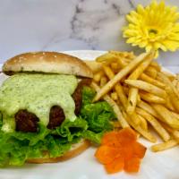 (V) BEYOND Burger · Vegan BEYOND Beef® patty, lettuce, house-made mayo sauce. Served with side of fries or salad...