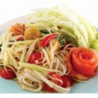 (V) Papaya Salad · Thai green papaya julienned and tossed together with tomatoes, green beans, chili, lime juic...