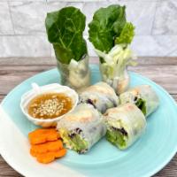 (V) Shrimp Fresh Rolls · Rice paper wrap stuffed with vegan shrimp, rice noodle, green cabbage, and red cabbage. Serv...
