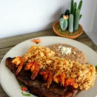 Bistec Playero Special · Broiled New York steak with sauteed shrimp.