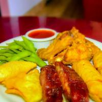 Combination Special · 2 egg roll, 2 BBQ ribs, 4 wings, 2 crab rangoon and edamame.