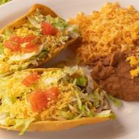Golden Taco Plate · Homemade crispy taco shell with taco meat, lettuce, shredded cheese and fresh diced tomatoes...