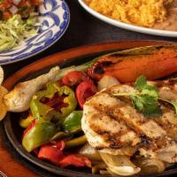 Grilled Chicken Dinner · Grilled Chicken Breast served with Pico de Gallo, Guacamole, homemade tortillas, Mexican Ric...