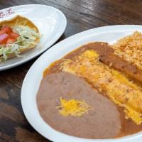 Laredo Dinner · Crispy Beef Taco, Cheese Enchilada, an tamale topped with chili gravy. Served with Mexican R...