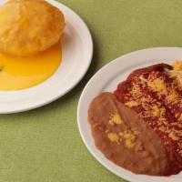 Meatless Special · Puffy Queso, Guacamole Salad, and Two Cheese Enchiladas topped with Spanish Sauce. Served wi...