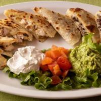 Combo Quesadilla · Grilled Beef & Chicken Quesadillas made with homemade tortillas and melted cheese. Served wi...