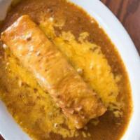Single Cheese Enchilada · A single cheese enchilada topped with Chili Gravy and melted cheese.