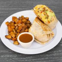 Breakfast Burrito · Scrambled eggs, bacon, avocado, tomatoes, hash browns and mixed cheese. Served with breakfas...