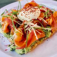 Smoked Salmon Avocado Toast Breakfast · Radish, pickled onions, avocado, poached egg and green onions. Served with breakfast potatoes.