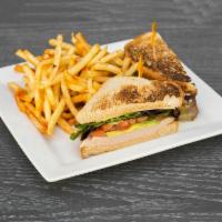 Smoked Turkey and Avocado Sandwich · Mixed greens, tomatoes, provolone cheese and chipotle mayo.