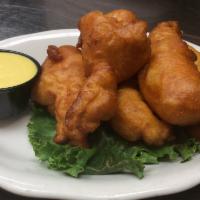 Chicken Tenders · Our original, fresh-made, and batter-dipt. Served with your choice of Honey Mustard or BBQ s...