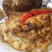 Rockfish Stuffed with Jumbo Lump Crabmeat · Broiled Rockfish Stuffed with jumbo lump crabmeat and topped with imperial sauce. Served wit...
