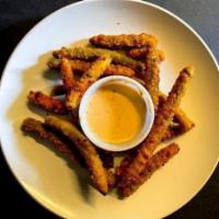Spicy Green Bean Fries · Spicy batter fried green beans with a southwestern sauce.