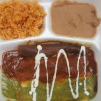 Vegan 3 Colors Cheese Enchiladas · one red one green one mole with Vegan Cheese Inside rice and beans on the side