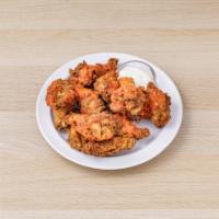Jumbo Buffalo Wings · Served with blue cheese & choice of Benny's sauce.