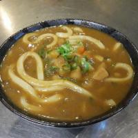 Vegetable Curry Udon  · Japanese style curry with assorted vegetables, served with udon noodles in our delicious sou...
