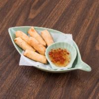 6 Pieces Baby Egg Rolls · Shrimp and chicken (ground) mixed with glass noodle, green onion, carrot wrapped in rice ski...