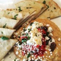 Hummus  · House-made with feta, sundried tomatoes, tzatziki and olives, served with warm pita bread or...