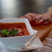 Tomato Basil Soup  · Smooth soup with pureed tomatoes and basil.
