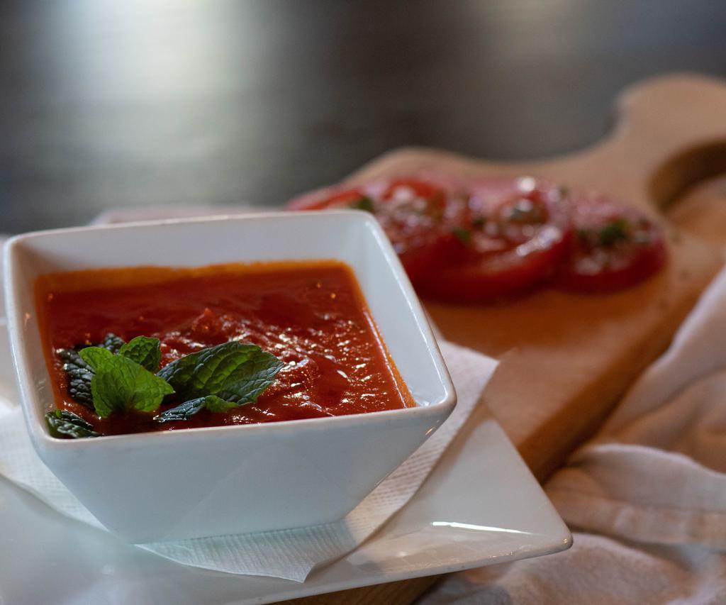 Tomato Basil Soup  · Smooth soup with pureed tomatoes and basil.