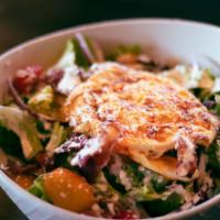 Cobb Salad  · Hearts of romaine, cherry tomatoes, bacon, fried egg, red onions, Gorgonzola with a house ra...