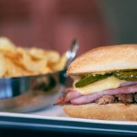 Cuban Sandwich  · Smoked ham, pulled pork, Dijon mustard, havarti, dill slices and jalapenos (upon request), s...