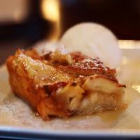 Warm Bread Pudding  · Our signature dessert, made with a maple-bourbon butter sauce, served with vanilla ice cream.