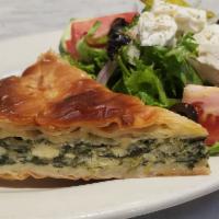 Spanakopita · Baked pie made of thin phyllo dough, spinach and feta cheese. Served with a Greek salad.