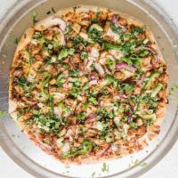 Chili Chicken Pizza · Chilli sauce, cheese, chicken, bell pepper, red onion, green onion and cilantro