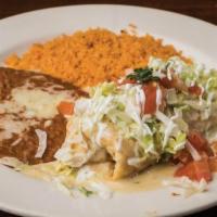 Chimi Rica · Grande. Flour tortilla, soft or fried, wrapped in ground beef or pulled chicken, topped with...