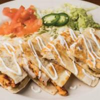 Coyote Fajita Quesadilla · Flour tortilla filled with cheese, grilled steak, chicken, or shrimp. Served with lettuce, t...