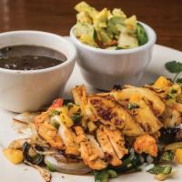 Pollo Tropical · Flame grilled lemon and pepper chicken breast, sauteed poblano peppers, mushrooms, onions, p...