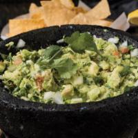 Guacamole Casera Mexicano · Made with the freshest ingredients. Our own family recipe. Served on a traditional lava ston...