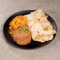 Burrito · Large flour tortilla filled with either tender chicken or seasoned
taco meat and covered in ...
