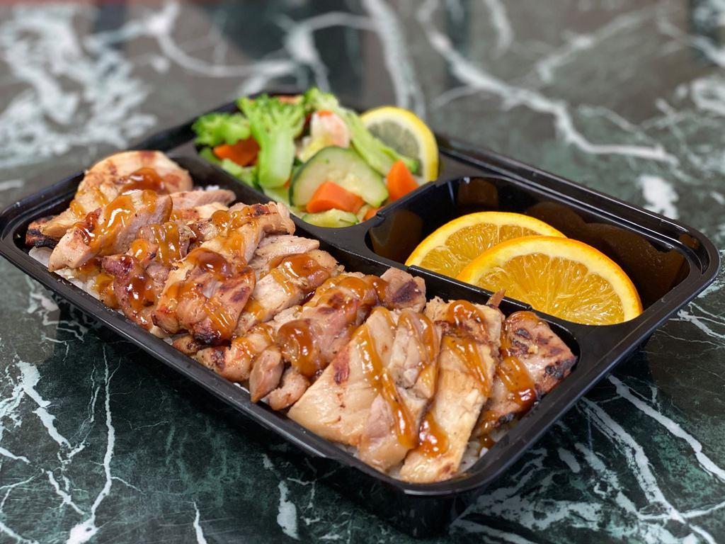 Chicken Plate · 1/2 pound of premium chicken, choice of rice, steamed vegetables with our signature teriyaki sauce.