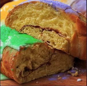 Gambino's King Cake (slice) · The King of King Cakes is our name for a reason. Made from moist danish dough and topped with our famous icing, this cinnamon infused cake is the perfect Mardi Gras treat or any day of the year you want it to be Mardi Gras!