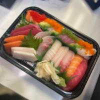 Sushi and Sashimi Combo · Rainbow roll, 5 pieces sushi and 10 pieces sashimi.miso soup and salad 