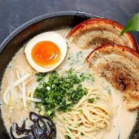Ramen Noodle · Tonkotsu style soup base with bamboo, corn, fish cake and seaweed egg.